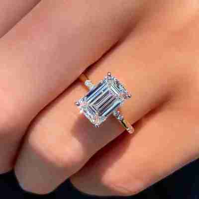 Emerald Cut Diamond Engagement Ring with Yellow Gold Band Profile Picture